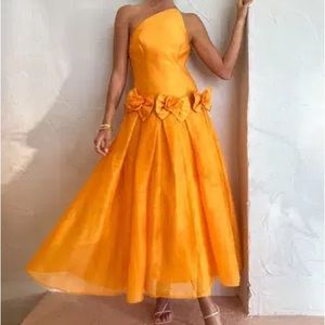 ALEMAIS MACIE ONE SHOULDER ROSETTE DRESS IN SAFFRON